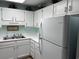 Updated kitchen featuring white cabinets, and stainless steel appliances at 5001 Little River Rd. # E-306, Myrtle Beach, SC 29577