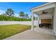 Fenced backyard features a covered patio, perfect for outdoor cooking and entertaining in a private outdoor space at 5068 Wavering Place Loop, Myrtle Beach, SC 29579