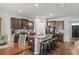Spacious kitchen with stainless steel appliances, island seating, and ample storage, perfect for culinary enthusiasts at 5068 Wavering Place Loop, Myrtle Beach, SC 29579