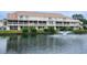 Charming condo with serene lake view featuring a fountain and multiple screened-in porches at 510 Fairwood Lakes Dr. # 17-P, Myrtle Beach, SC 29588