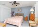 Bright bedroom with a ceiling fan, offering a serene space with a closet for ample storage at 510 Fairwood Lakes Dr. # 17-P, Myrtle Beach, SC 29588
