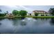 Scenic community pond with a fountain, wooden gazebo, and beautiful landscaping at 510 Fairwood Lakes Dr. # 17-P, Myrtle Beach, SC 29588
