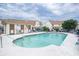 Community swimming pool surrounded by chairs and condo buildings at 510 Fairwood Lakes Dr. # 17-P, Myrtle Beach, SC 29588