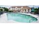 Community swimming pool surrounded by lounge chairs and building exteriors at 510 Fairwood Lakes Dr. # 17-P, Myrtle Beach, SC 29588