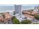 Expansive aerial view of a beachside resort showcasing ample parking, nearby swimming pools, and scenic ocean views at 5511 North Ocean Blvd. # 806, Myrtle Beach, SC 29577