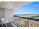 Spacious balcony with ocean view, white railing, and blue trim is the perfect place to relax at 5511 North Ocean Blvd. # 806, Myrtle Beach, SC 29577