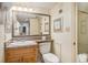 This bathroom offers a great mirror, a lovely sink and toilet and a view to the bedroom at 5511 North Ocean Blvd. # 806, Myrtle Beach, SC 29577