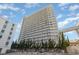 Modern high-rise condominium building boasts multiple balconies and sleek architectural design at 5511 North Ocean Blvd. # 806, Myrtle Beach, SC 29577