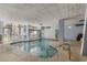 Bright indoor pool area with large windows, offering a comfortable and accessible swimming experience at 5511 North Ocean Blvd. # 806, Myrtle Beach, SC 29577
