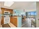 Open kitchen with a dining area and access to the living room and balcony with ocean views at 5511 North Ocean Blvd. # 806, Myrtle Beach, SC 29577