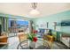 Bright living room with ocean view balcony access, dining area, and comfortable seating at 5511 North Ocean Blvd. # 806, Myrtle Beach, SC 29577