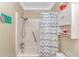 The well-lit bathroom features a combined shower and tub, perfect for relaxation at 5905 S Kings Hwy. # 523 A, Myrtle Beach, SC 29575