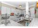 Clean and tidy kitchen with white countertops and cabinets, and stainless steel sink at 5905 S Kings Hwy. # 523 A, Myrtle Beach, SC 29575