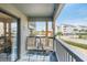 Inviting balcony with seating, providing an outdoor space for relaxation and enjoying neighborhood views at 6000 N Ocean Blvd. # 133, North Myrtle Beach, SC 29582