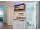 Functional bar area with a sink, and a rack to hold glassware at 6000 N Ocean Blvd. # 133, North Myrtle Beach, SC 29582