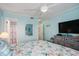 Bedroom with a dresser, television and ensuite bath at 6000 N Ocean Blvd. # 133, North Myrtle Beach, SC 29582