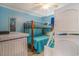 Charming bunk beds in a light blue bedroom with nautical decor and a ceiling fan at 6000 N Ocean Blvd. # 133, North Myrtle Beach, SC 29582