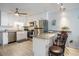 Open kitchen with a breakfast bar, stainless appliances, and granite counters at 6000 N Ocean Blvd. # 133, North Myrtle Beach, SC 29582