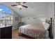 Bedroom featuring a ceiling fan, a window, and an armchair at 6001 - B7 S Kings Hwy., Myrtle Beach, SC 29575