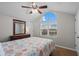 Bedroom featuring a ceiling fan, a dresser, and a window at 6001 - B7 S Kings Hwy., Myrtle Beach, SC 29575