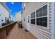 Exterior featuring a deck, a door, and multiple windows at 6001 - B7 S Kings Hwy., Myrtle Beach, SC 29575