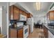Functional kitchen layout with modern appliances and an adjacent dining area at 6001 - B7 S Kings Hwy., Myrtle Beach, SC 29575