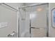 Bathroom shower stall with a white shower head and frosted sliding doors at 6001 - B7 S Kings Hwy., Myrtle Beach, SC 29575