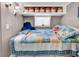 Comfortable bedroom with colorful quilt and ample storage at 6001-N73 South Kings Hwy., Myrtle Beach, SC 29575