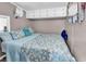 Inviting bedroom with a decorative mirror and bright comforter at 6001-N73 South Kings Hwy., Myrtle Beach, SC 29575