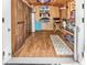 Unique interior design with wood floors, TV, furniture, and a creative use of space at 6001-N73 South Kings Hwy., Myrtle Beach, SC 29575