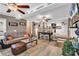 Cozy living room with ceiling fans, comfortable seating, and an open floor plan to the kitchen at 6001-N73 South Kings Hwy., Myrtle Beach, SC 29575