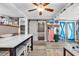 Open-concept living area with a dining table, and easy access to the bedroom at 6001-N73 South Kings Hwy., Myrtle Beach, SC 29575