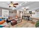 Cozy living room with ceiling fans, comfortable sofas, and an open layout at 6001-N73 South Kings Hwy., Myrtle Beach, SC 29575