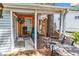 Inviting patio area with comfortable seating and a charming outdoor shower at 6001-N73 South Kings Hwy., Myrtle Beach, SC 29575