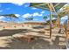 Recreation area featuring benches, corn hole, and palm trees at 6001-N73 South Kings Hwy., Myrtle Beach, SC 29575