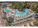 Aerial view of a vibrant waterpark featuring pools, slides, palm trees, and ample seating at 6001-N73 South Kings Hwy., Myrtle Beach, SC 29575
