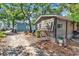 Exterior view of the cottage and small yard at 6001-N74 South Kings Hwy., Myrtle Beach, SC 29575