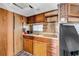 Functional kitchen space with ample cabinetry, countertop space, and wood finishes, perfect for meal preparation at 6001-N74 South Kings Hwy., Myrtle Beach, SC 29575