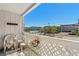Bright balcony with white lattice trim and seating offering views of the town and community at 625 N Waccamaw Dr. # 107, Murrells Inlet, SC 29576