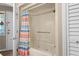 Bright bathroom with a tub-shower combo and a colorful shower curtain at 625 N Waccamaw Dr. # 107, Murrells Inlet, SC 29576