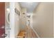 Inviting hallway featuring warm tones, beach-themed decor, and a stylish bench at 625 N Waccamaw Dr. # 107, Murrells Inlet, SC 29576