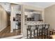 Modern kitchen featuring stainless steel appliances and bar seating at 625 N Waccamaw Dr. # 107, Murrells Inlet, SC 29576