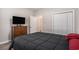 Bedroom featuring a dresser, closet, and doorway with carpet and neutral colored walls at 630 Heartwood Dr., Conway, SC 29526