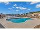 Sparkling community pool featuring a fenced area and clear view of the neighborhood pond at 630 Heartwood Dr., Conway, SC 29526