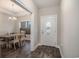 Dining room featuring a table with six chairs, a chandelier, and views of the front yard at 630 Heartwood Dr., Conway, SC 29526
