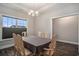Dining room featuring a table with six chairs, hardwood floors, and a chandelier at 630 Heartwood Dr., Conway, SC 29526