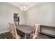 Dining room featuring a table with six chairs, hardwood floors, and a view of the kitchen at 630 Heartwood Dr., Conway, SC 29526