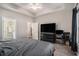 Comfortable main bedroom with carpet, a ceiling fan, and ensuite bathroom access at 630 Heartwood Dr., Conway, SC 29526