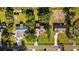 Aerial view of the property showcasing the home, deck, and surrounding landscape at 645 Boundary Line Dr. Nw, Calabash, NC 28467