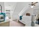 This bedroom features a unique ceiling, carpeting, and bright natural light at 645 Boundary Line Dr. Nw, Calabash, NC 28467